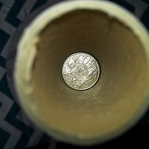 Coin in roll upright